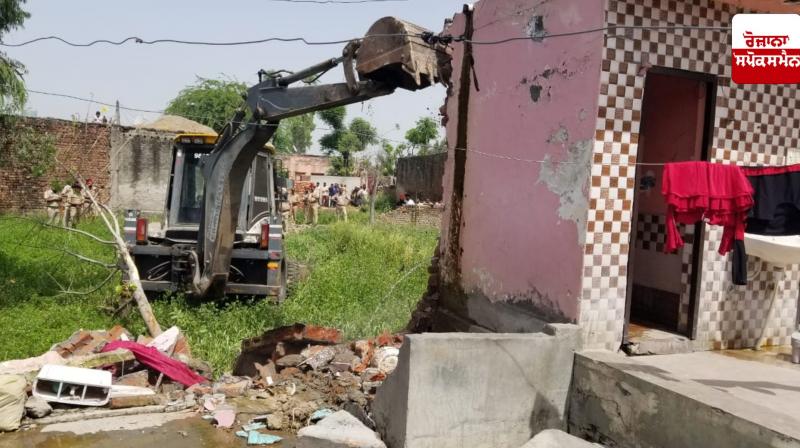 Ditch machine used on illegal construction done by drug smugglers on panchayat lands Ditch machine used on illegal construction done by drug smugglers on panchayat lands