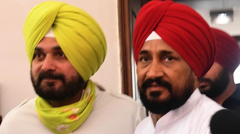 Navjot Sidhu and Charanjit Singh Channi Navjot Sidhu and Charanjit Singh Channi