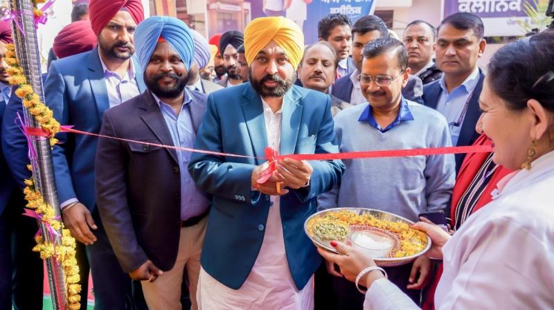 CM MANN AND DELHI CM ARVIND KEJRIWAL DEDICATED 500 AAM AADMI CLINIC TO THE PEOPLE OF PUNJAB CM MANN AND DELHI CM ARVIND KEJRIWAL DEDICATED 500 AAM AADMI CLINIC TO THE PEOPLE OF PUNJAB