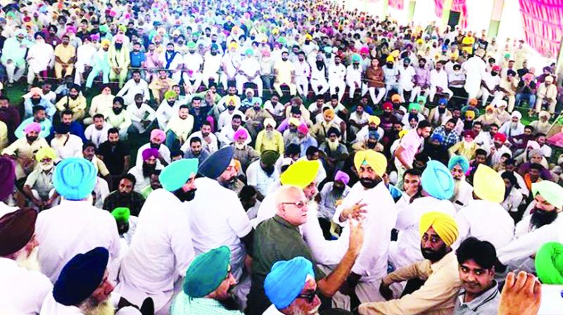 During the convention, Sukhpal Singh Khaira and Leaders During the convention, Sukhpal Singh Khaira and Leaders