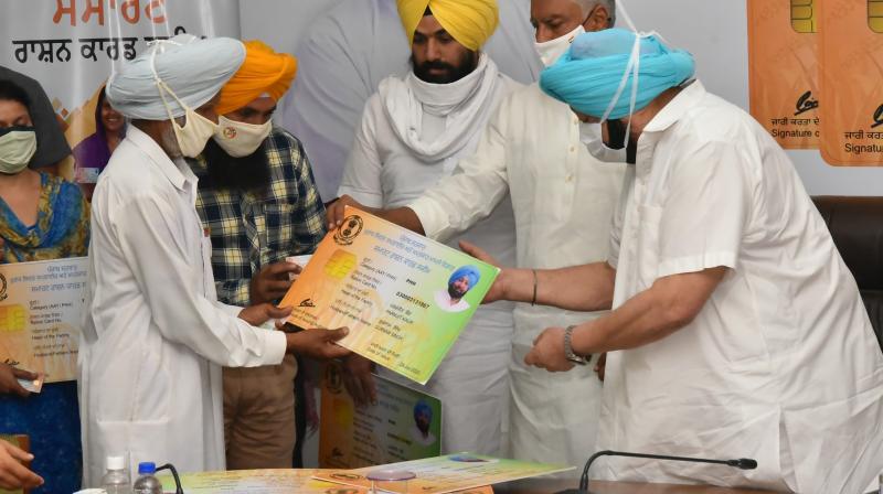 Capt Amarinder rolls out state-wide Smart Ration Card scheme to cover 1.41 cr NFSA beneficiaries Capt Amarinder rolls out state-wide Smart Ration Card scheme to cover 1.41 cr NFSA beneficiaries