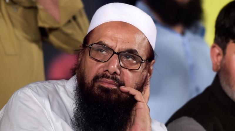 India asks Pakistan to hand over 26/11 terror attack mastermind Hafiz Saeed India asks Pakistan to hand over 26/11 terror attack mastermind Hafiz Saeed