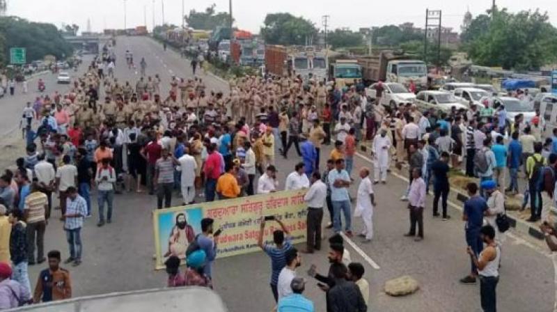 shri guru ravidas ji temple demolish decision against delhi and punjab protest