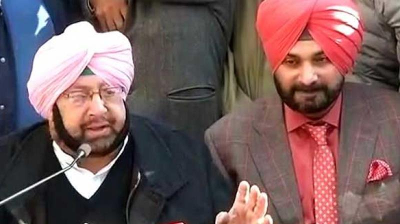 Captain Amrinder Singh with Navjot Sidhu