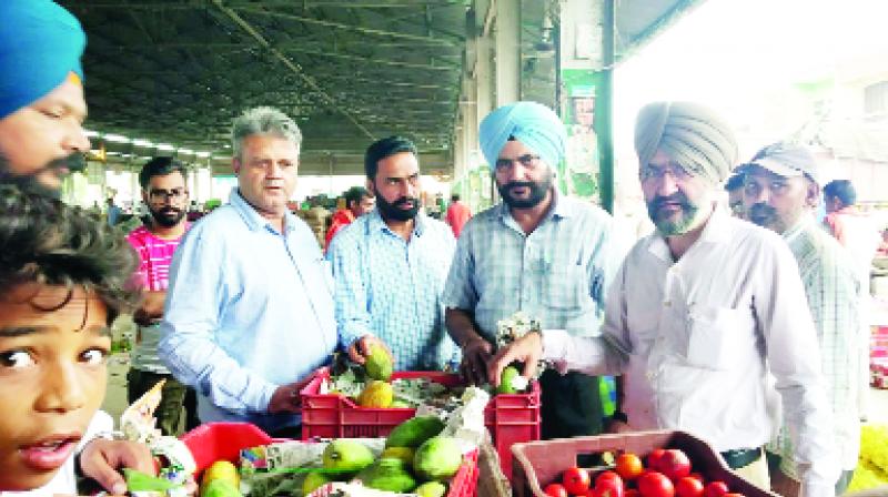 Officers during Checking fruits and Vegetables