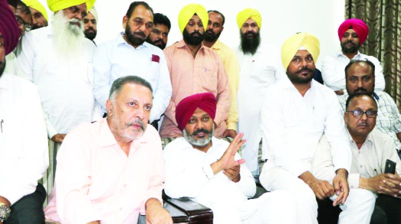Talking to the media,Harpal Singh Cheema and his co-in-charge of Punjab Dr. Balbir Singh Talking to the media,Harpal Singh Cheema and his co-in-charge of Punjab Dr. Balbir Singh