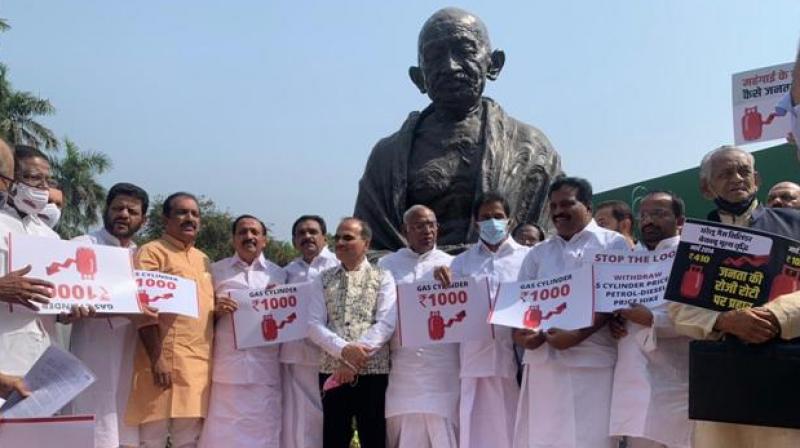Congress MPs protest against rising oil prices in Parliament House complex Congress MPs protest against rising oil prices in Parliament House complex