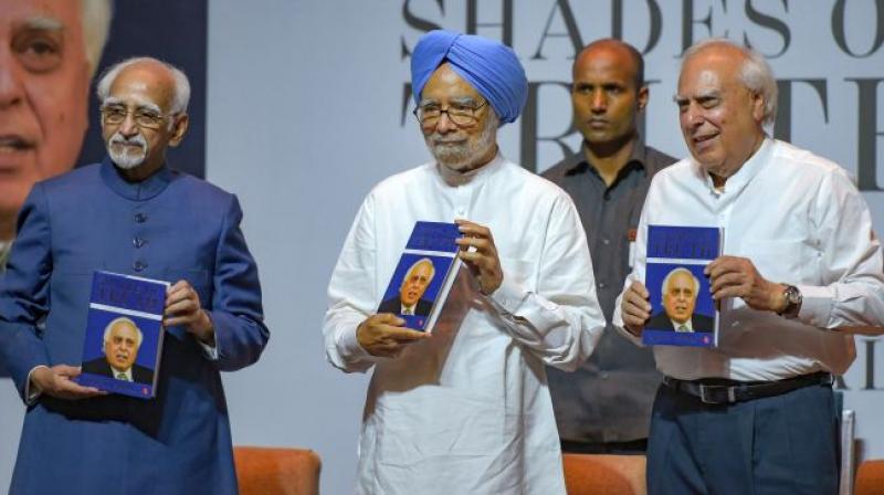 Hamid Ansari, Dr. Manmohan Singh and Kapil Sibal