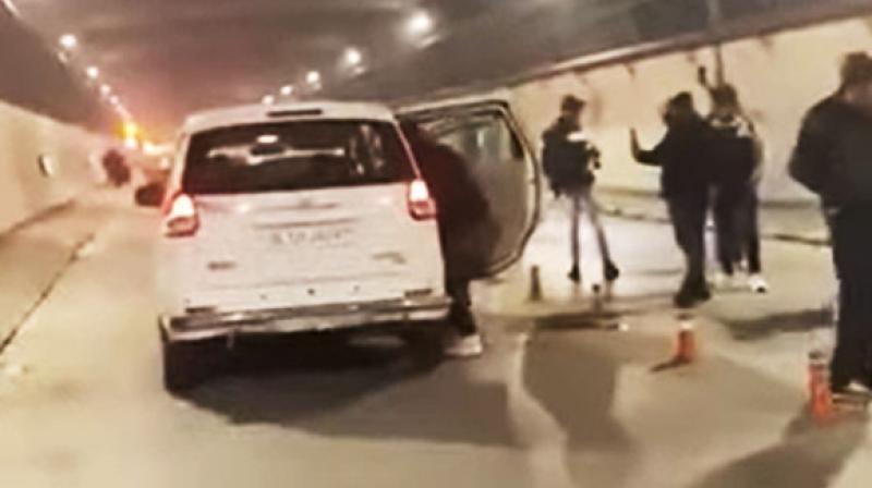 Atal Tunnel - Traffic Jam Issue created by DL number Car.. 8 Persons arrested under section 188, 270 and 34. Atal Tunnel - Traffic Jam Issue created by DL number Car.. 8 Persons arrested under section 188, 270 and 34.