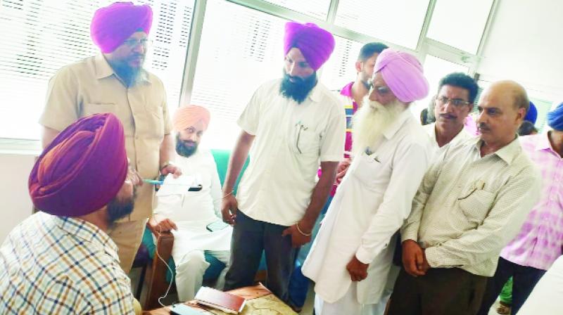 Sukhjinder Singh Randhawa listening to Problems of People 