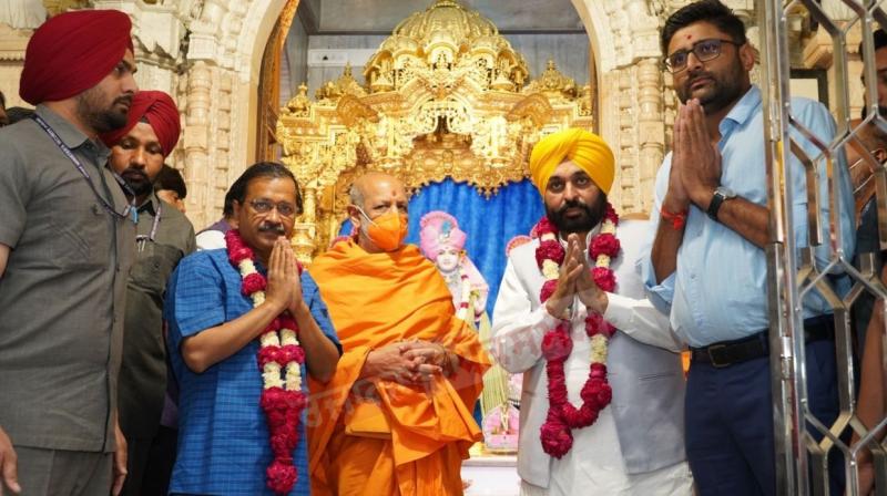 Arvind Kejriwal and CM Bhagwant Mann pay obeisance at Swami Narayan Temple Arvind Kejriwal and CM Bhagwant Mann pay obeisance at Swami Narayan Temple