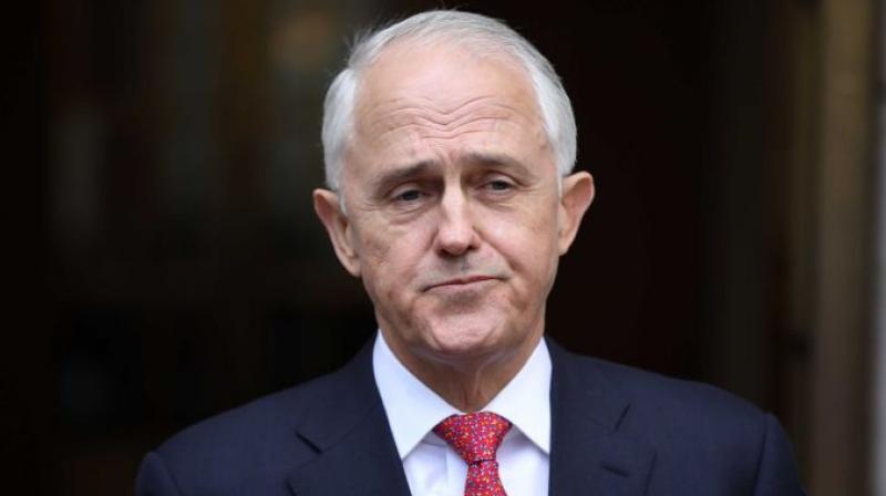 Former Australian PM Malcolm Turnbull urges country to not buckle under pressure from China