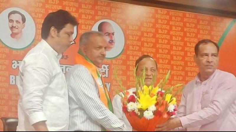 ex-jailer Sunil Sangwan joins BJP ex-jailer Sunil Sangwan joins BJP