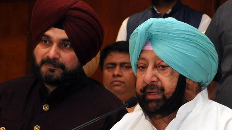 Captain Amarinder Singh and Navjot Singh Sidhu Captain Amarinder Singh and Navjot Singh Sidhu
