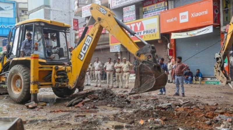 Temples and shrines removed for flyover in Delhi's Bhajanpura Temples and shrines removed for flyover in Delhi's Bhajanpura