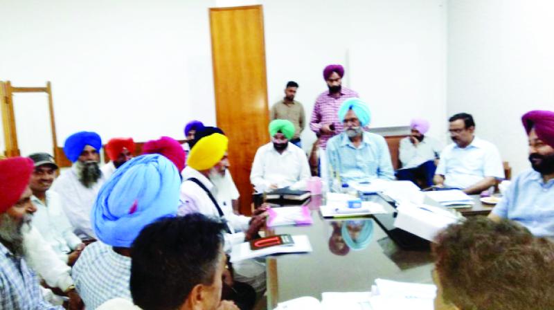 Gurpreet Singh Kangar presiding the meeting.