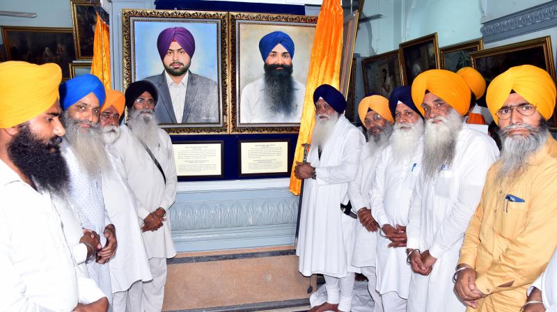 Pictures of seven personalities including martyrs of Behbal Kalan Golikand adorned in Central Sikh Museum Pictures of seven personalities including martyrs of Behbal Kalan Golikand adorned in Central Sikh Museum