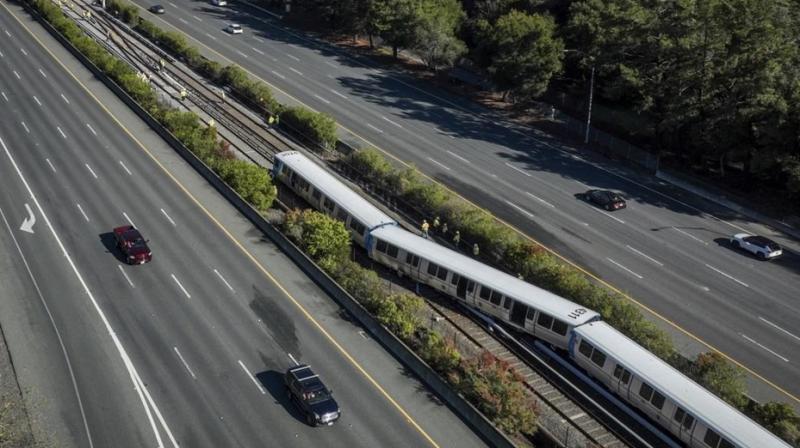 America:  Train derails and catches fire near San Francisco