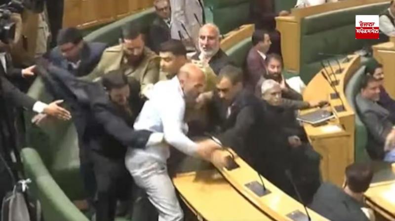 Uproar on Article 370 in the Jammu and Kashmir Legislative Assembly for the third consecutive day, scuffle among MLAs Uproar on Article 370 in the Jammu and Kashmir Legislative Assembly for the third consecutive day, scuffle among MLAs