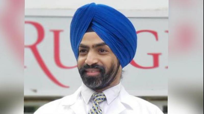 Dr Karminder Singh