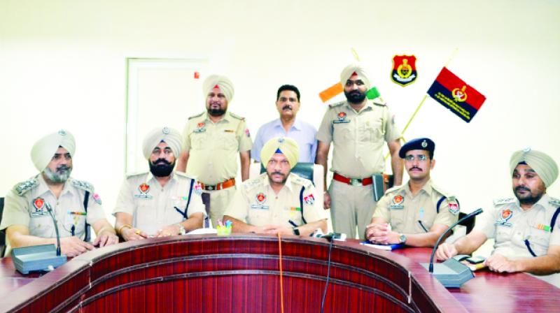 SSP Swarndeep Singh and others addressing the press conference