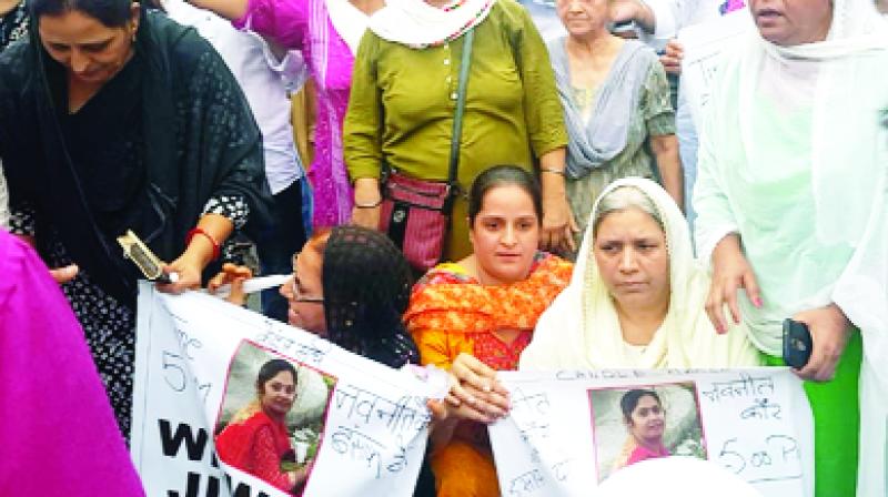 Bibi Ranjit Kaur and other during candlelight march Bibi Ranjit Kaur and other during candlelight march