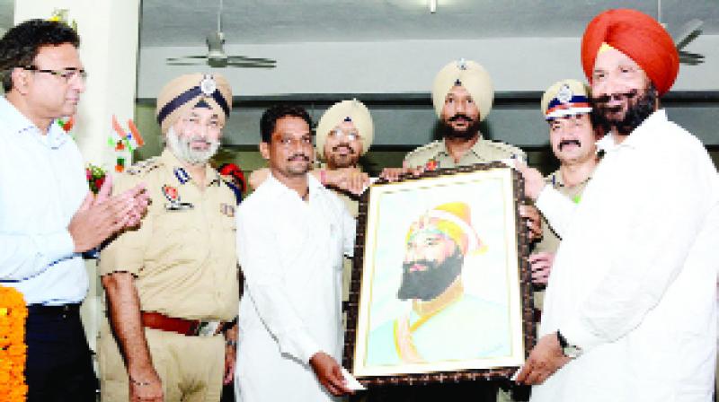 Jail Minister Sukhjinder Singh Randhawa and Police Officers during the function Jail Minister Sukhjinder Singh Randhawa and Police Officers during the function