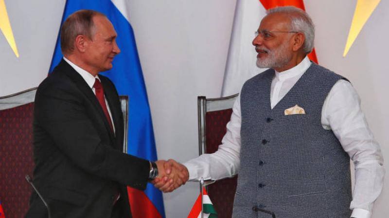 Narendra Modi Shaking hands Vladmir Putin