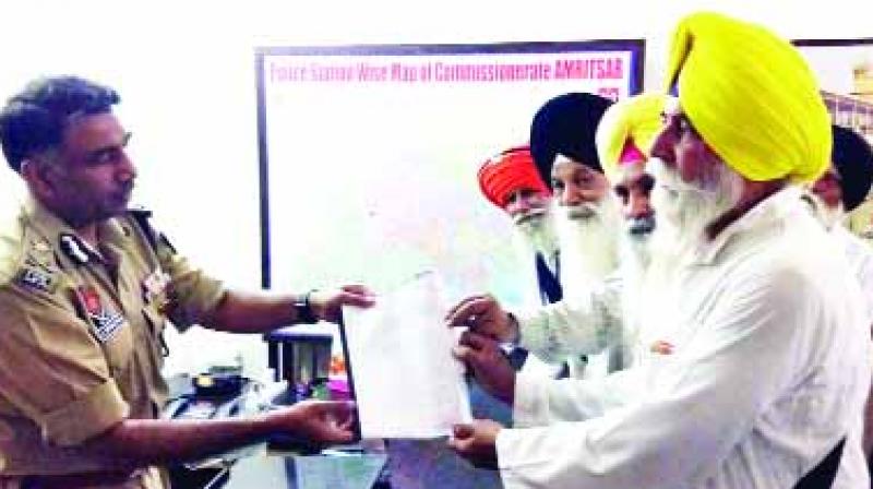 Baldev Singh Sirsa giving Letter to Police