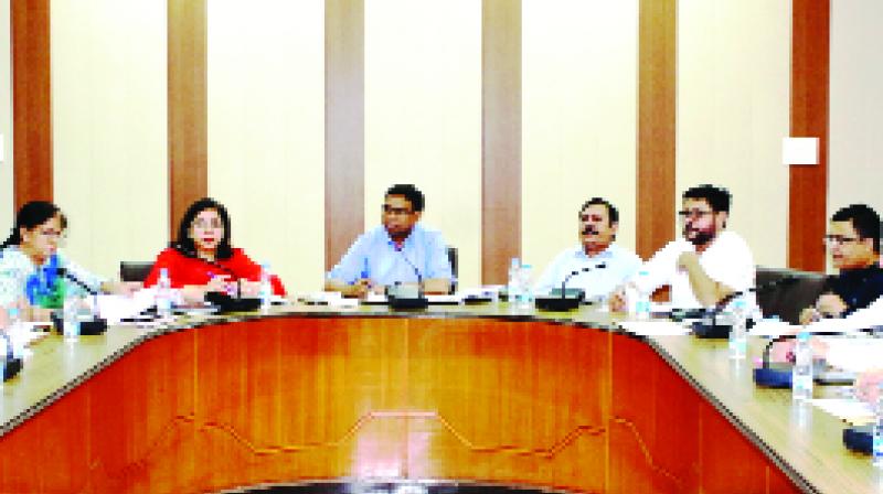 Deputy Commissioner During Review Meeting Deputy Commissioner During Review Meeting