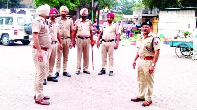 Police Standing in Market Police Standing in Market