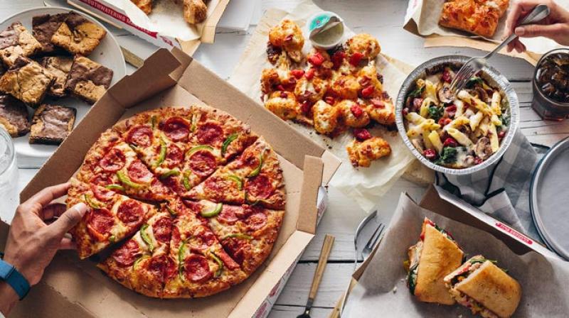 Travelers order pizza burgers restaurants on trains Travelers order pizza burgers restaurants on trains