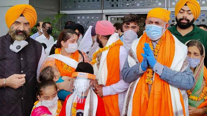 the first batch of Afghan Sikhs who reached India on Sunday, fleeing religious persecution. the first batch of Afghan Sikhs who reached India on Sunday, fleeing religious persecution.
