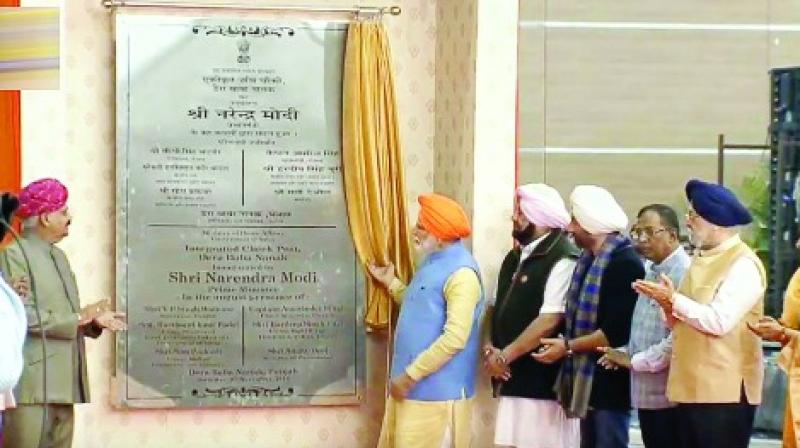 Hindi and English only on the inaugural board attached to Kartarpur intersection Hindi and English only on the inaugural board attached to Kartarpur intersection