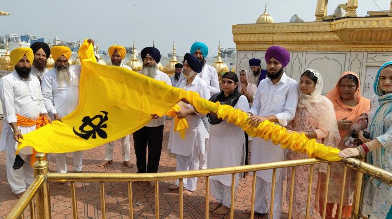 In the Harmandir Sahib the saffron-colored Nishan Sahib was removed In the Harmandir Sahib the saffron-colored Nishan Sahib was removed