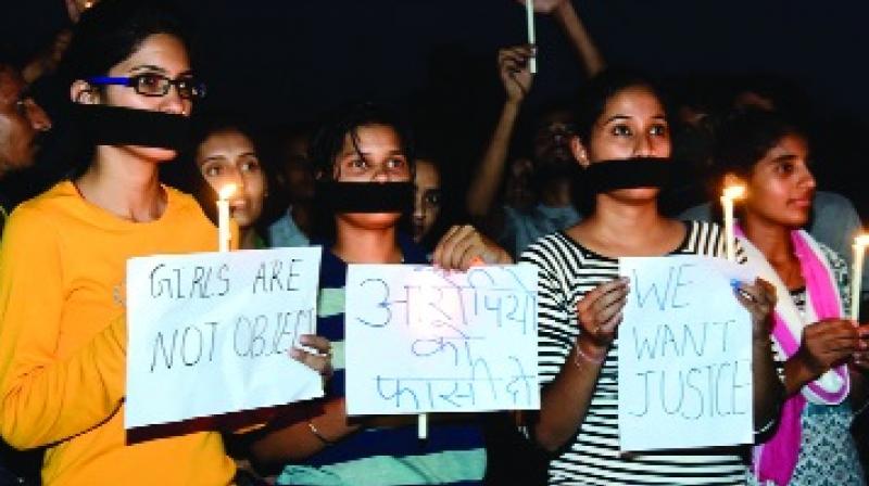 Girl doing Candle March For Justice Girl doing Candle March For Justice