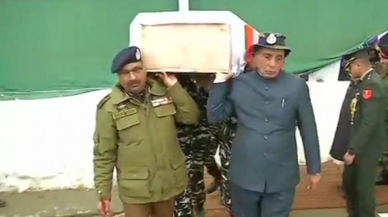 Rajnath Singh, J&K DGP Dilgabh Singh Carry Coffin of Soldier Killed in Terror Strike