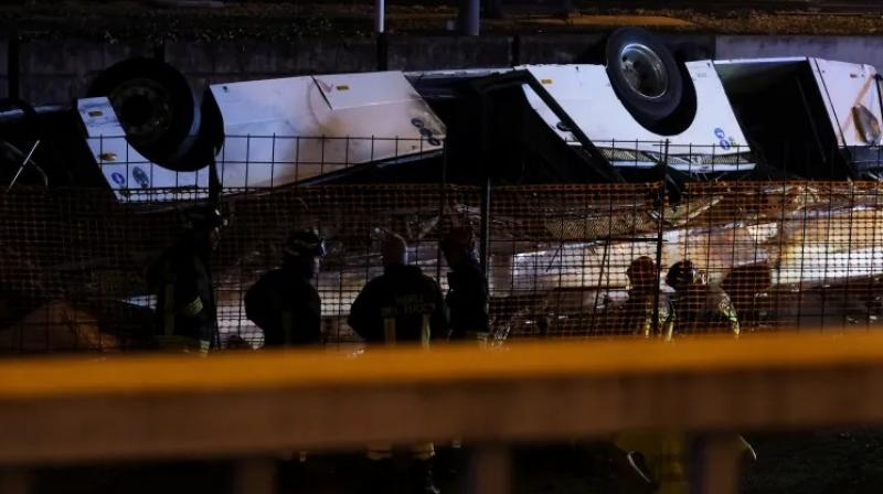 At least 21 dead after Italian bus carrying tourists falls from Venice overpass
