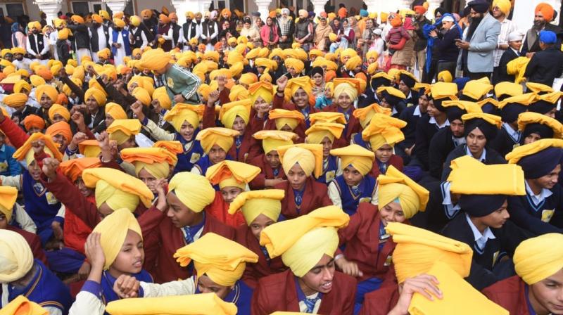  1300 children were decorated with turbans during the national turban bandi ceremony at Sri Akal Takht Sahib