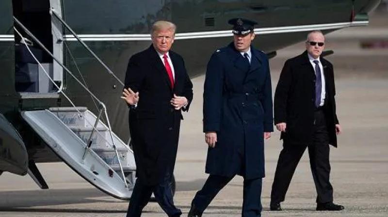 Donald trump india visit us air force hercules aircraft car reaches ahmedabad