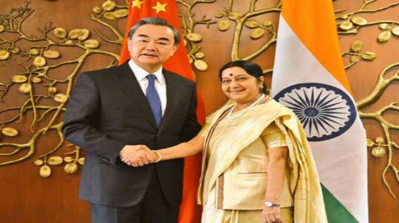 Sushma Swaraj with Wang Yi Sushma Swaraj with Wang Yi