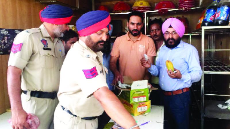 Police Officer Checking Fruits And Vegetables Police Officer Checking Fruits And Vegetables