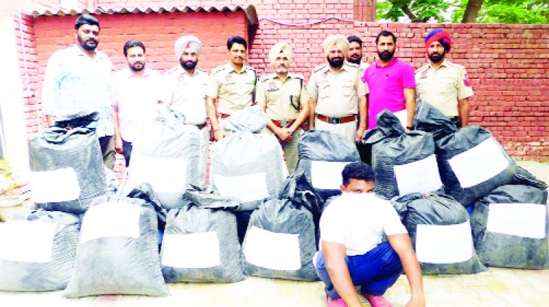 Police With Recovered Drugs from accused
