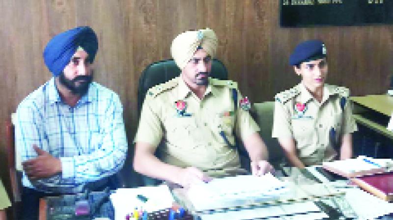 Giving information during the Press Conference, SP Investigation Harpal Singh