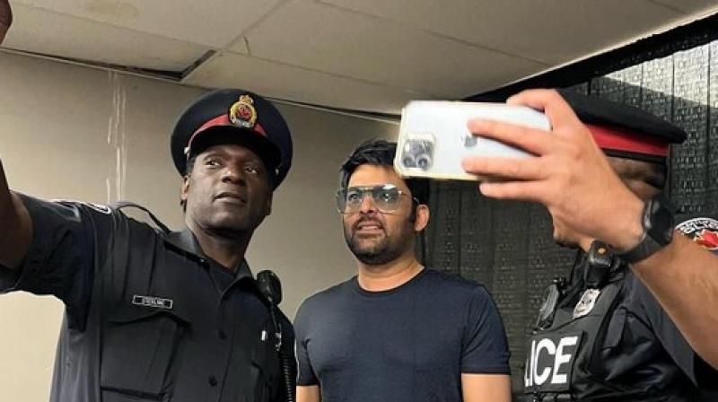 Photo shared by Kapil Sharma with Canadian police officers