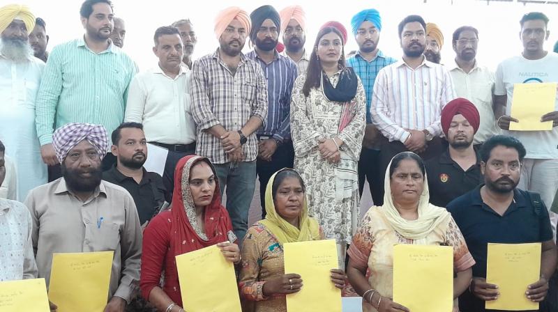 Anmol Gagan Mann Distributes Letters of Intent (LoIs) worth Rs. 2.70 Crores to 154 Families for Mud House Renovation Anmol Gagan Mann Distributes Letters of Intent (LoIs) worth Rs. 2.70 Crores to 154 Families for Mud House Renovation