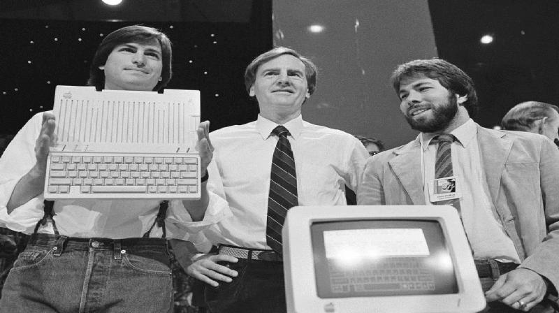John Sculley, center, president and CEO, and Steve Wozniak