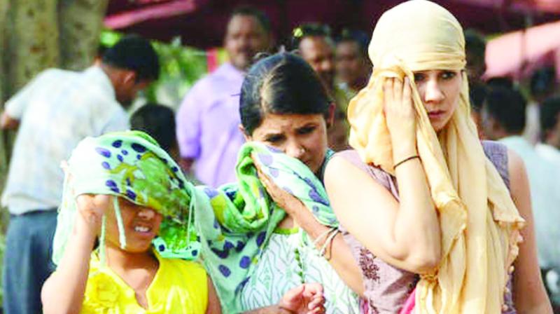 Women upset with heat Women upset with heat