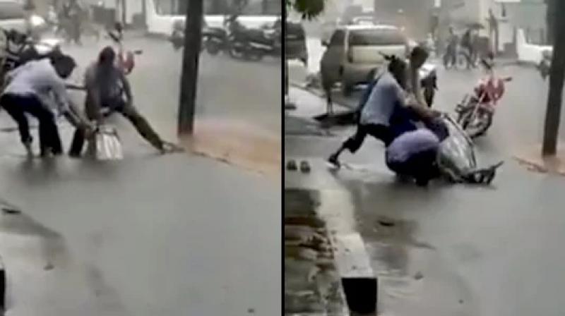 Mumbai pothole swallows a whole bike in chembur video goes viral Mumbai pothole swallows a whole bike in chembur video goes viral