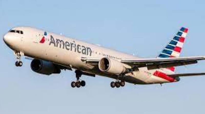 American Airlines flight delayed after teens refuse to wear face masks American Airlines flight delayed after teens refuse to wear face masks